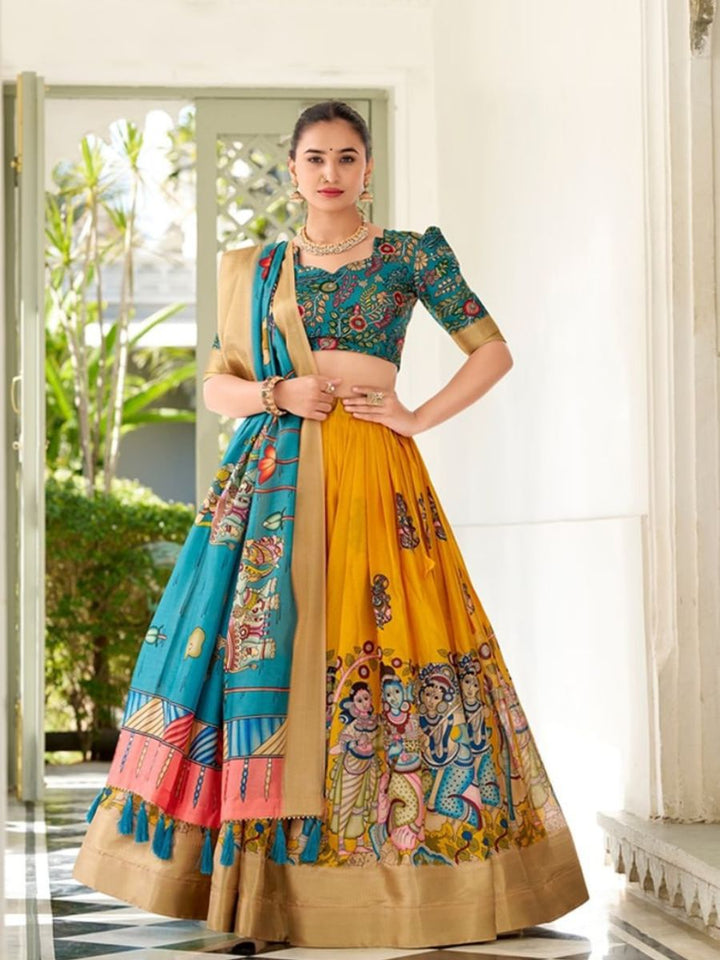 Yellow Handpainted Lehenga with Teal Blouse & Dupatta