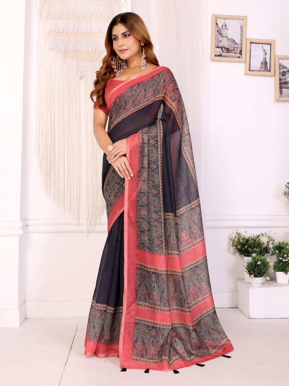 Elegant Black Saree with Reddish Pink Border